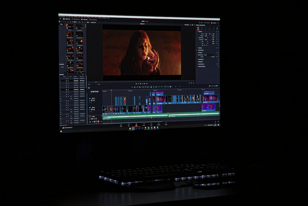 professional video editor at computer
