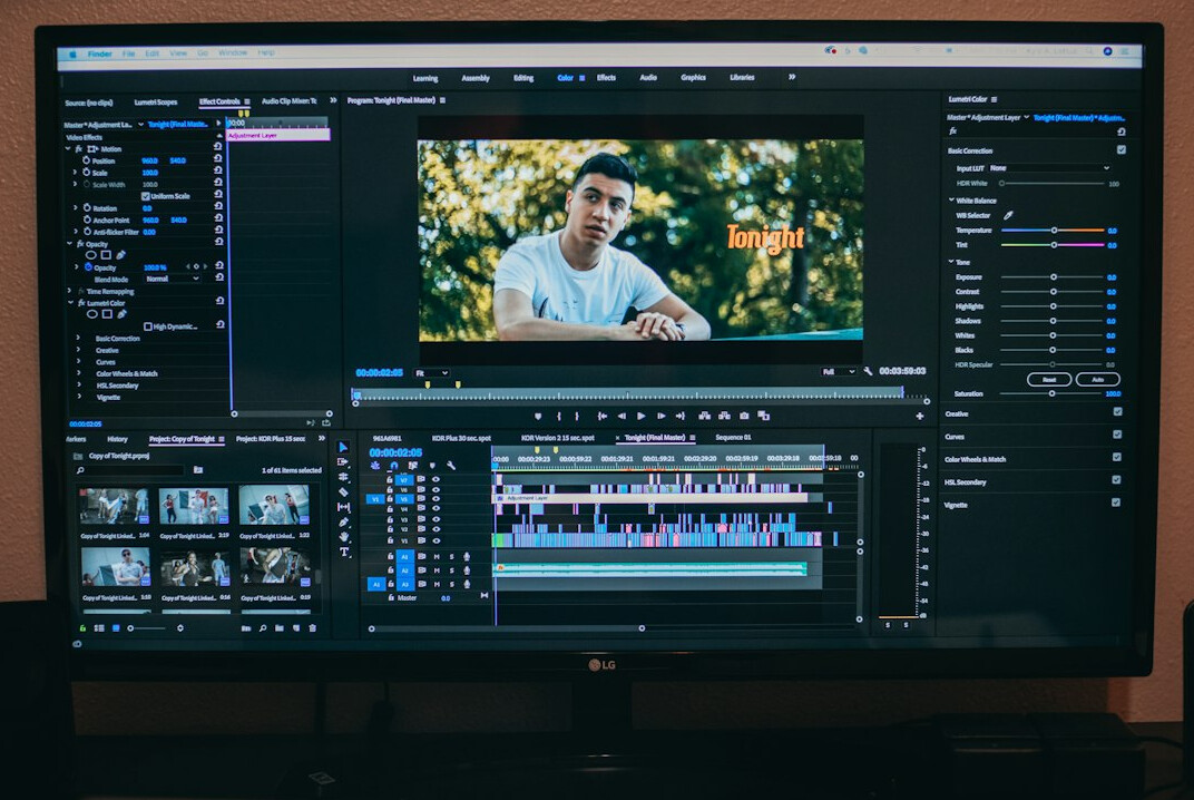 professional video editor at computer
