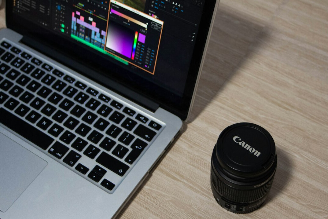 filmmaker editing on laptop