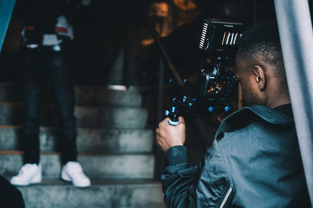 filmmaker reviewing footage